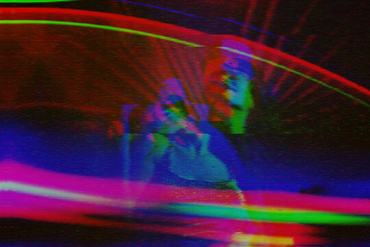 Psychedelic motion blur with vibrant glitch effect and light trails