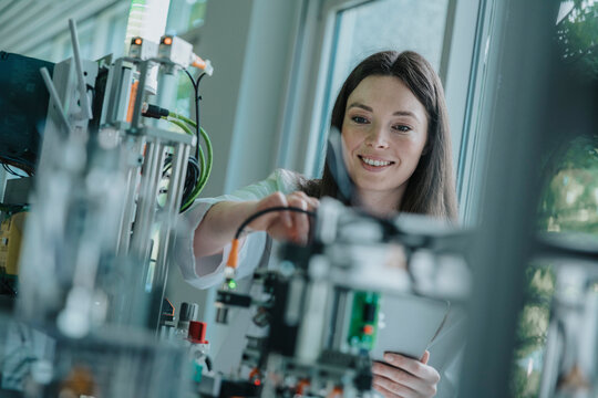 Scientist using sorting machine for research in laboratory setting