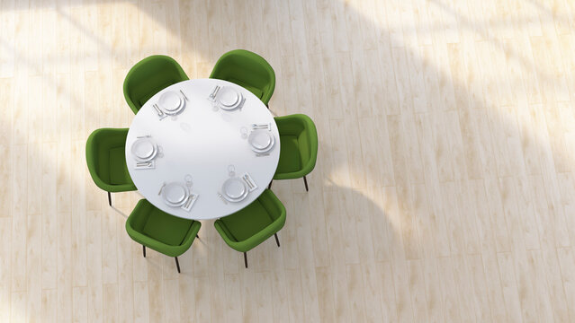 Directly above view of round table and green chairs with copy space