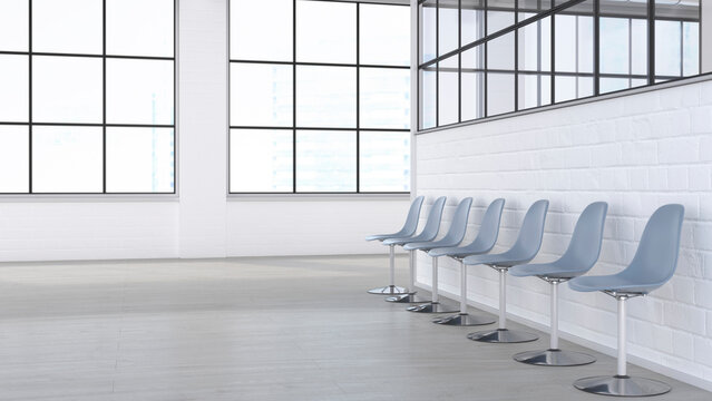 Modern empty loft waiting area with row of seating