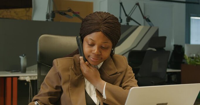 Helpdesk representative engaging with various digital tools