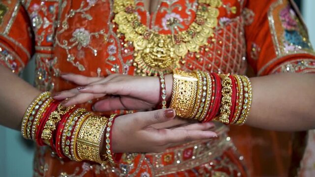 Traditional Indian Bride Hand Details with Mehndi and Bangles