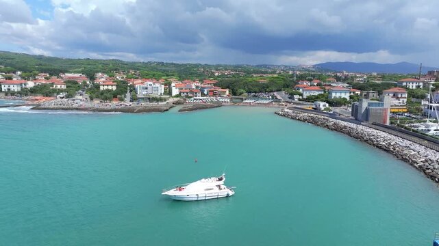 motor yacht sunbathing off the coast of Castiglioncello, Italy, luxurious lifestyle with Italian flair