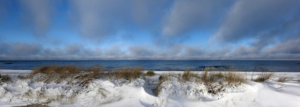 baltic sea coastal scenery with snow on the dunes in Heidkate, Germany