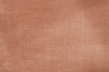 Fototapeta premium Old wooden table texture with scratches and stains. Burgundy vintage background for design, overlays, and decorative backdrops. Close-up textured of aged, patinated copper with warm, rich brown.
