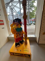 Naklejka premium April 2026, Singapore: Lego Monkie Kid model displayed in Lego store in Sentosa, Singapore