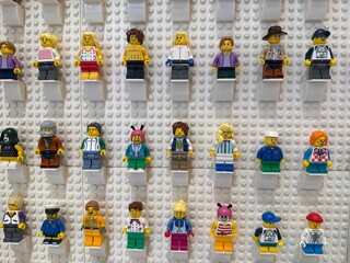 Fototapeta premium April 2026, Singapore: LEGO minifigures on a white wall