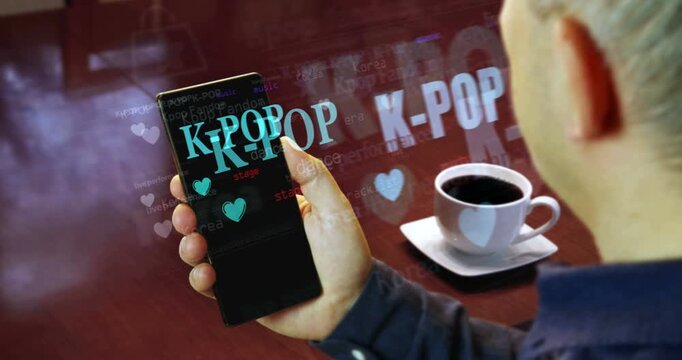 K-POP Korean pop music style symbol on smartphone. Abstract concept of news titles on phone in hand.