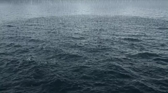 Rainstorm over stormy sea, heavy rain falling on choppy ocean waves 4K Ai HD high quality video.