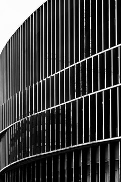 Modern architecture abstract facade where curve line and pattern shape a monochrome minimalism composition with elegant graphic detail