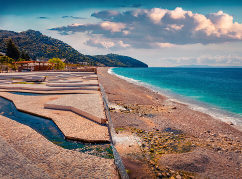 Picturesque summer view of publik beach of Dhermi town. Captivating morning seascape of Adriatic sea with Corfu island on background. Spectacular outdoor scene of Albania. Vacation concept background.