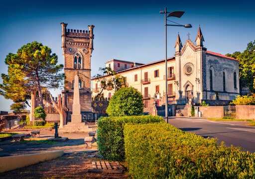 Sunny morning scene of historical landmark - Torre della Specola and Santa Croce church. Colorful summer cityscape of Sapri town, Italy. Traveling concept background.
