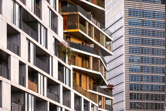 Modern residential architecture facade with balcony windows and tower detail in urban Paris France showing elegant apartment design