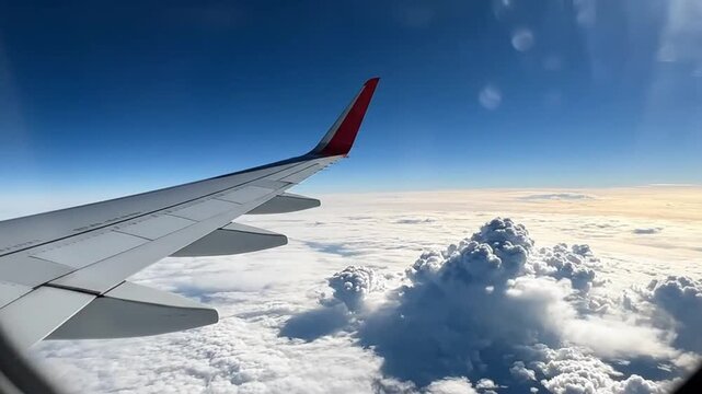 Airplane wing view from window for outdoor lifestyle brands and nature documentaries