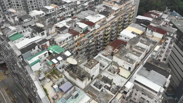Tilted drone shot of (in)famous 'Monster Building', a government subsidized housing block dating from the 1960s in Hong Kong