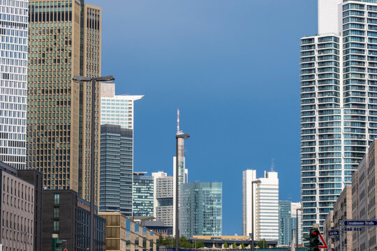 Modern frankfurt skyline skyscraper architecture in daylight showing urban city tower facade with glass highrise design and clear sky