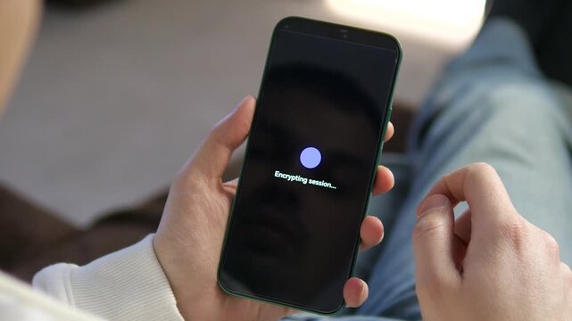 Close-up of user entering a security code for two-factor authentication on a smartphone. Sequence shows identity verification and session encryption. Perfect for cybersecurity, data privacy, and