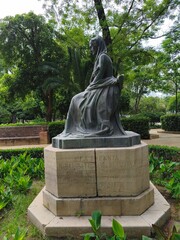 Obraz premium Bronze statue of Infanta Maria Luisa de Borbon in Parque Maria Luisa, Seville, Spain