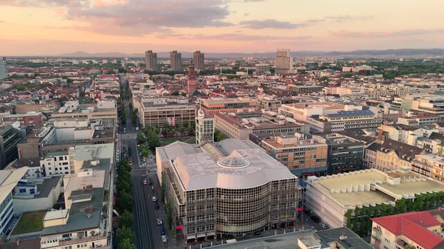 Aerial drone footage of Mannheim and Christuskirche on summer evening, showcasing German architecture. Mannheim, Germany