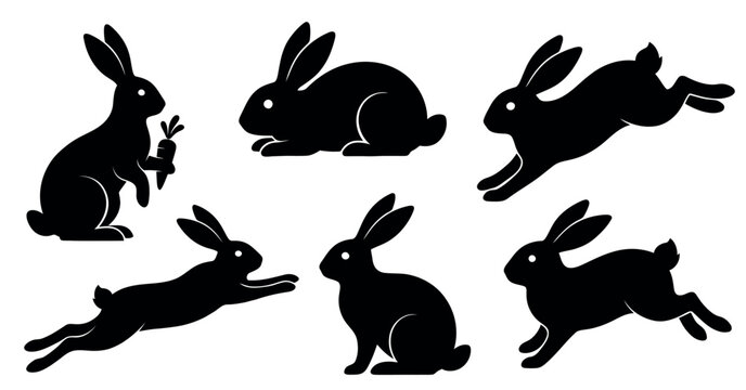 Silhouettes of easter bunnies isolated on a white background.