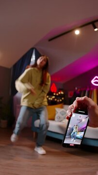 Teen girl dancing casually at home modern youth lifestyle concept