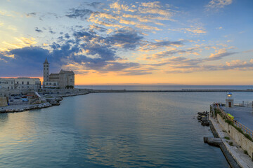 Obraz premium View of harbour of Trani with the Cathedral at sunset in Apulia, Italy. 