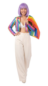 Smiling young woman with purple hair in rainbow jacket holding pride flag isolated on transparent background