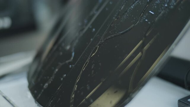 Close Up of Water Beading on a Paint Protection Film Demonstration Display Stand