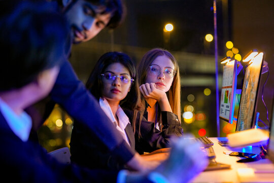 Cybersecurity professional analyzing real time threat intelligence and zero trust architecture. Expert developer managing cloud native security and encryption protocols under neon lights.