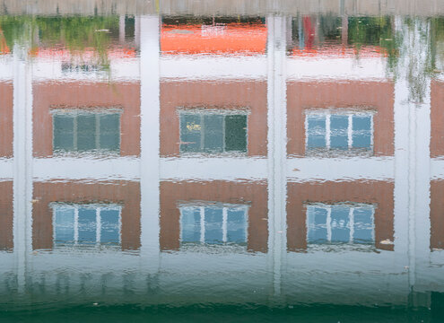 Abstract building reflection, on canal water in Strasbourg, France