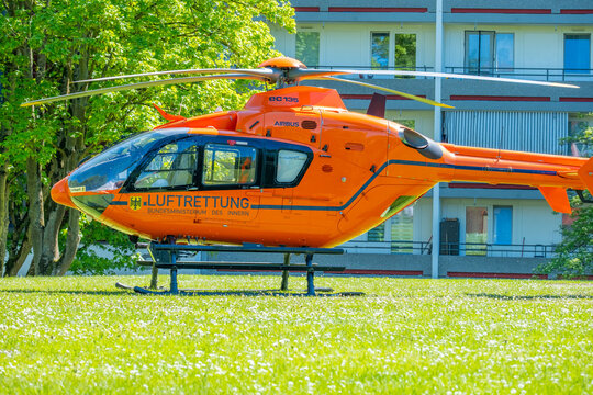 orange rescue helicopter air ambulance, German Special emergency medical service aviation Airbus EC135, air ambulance, emergency operations and medical evacuation, challenging rescue tasks disasters