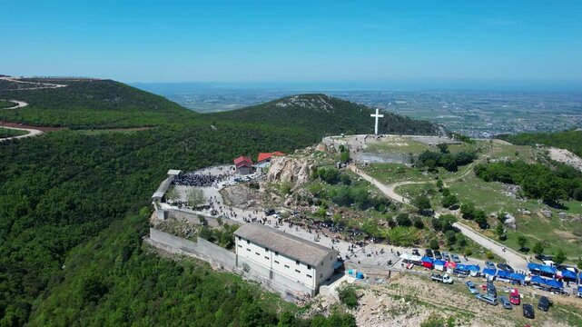 Panoramic view of the religious complex at Kisha e Shna Ndout with the Adriatic horizon