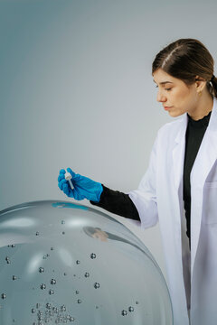 3D biotech researcher bubble with pipette in sterile lab
