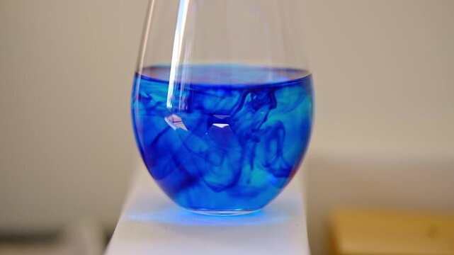 Methylene Blue in a glass diluted into water