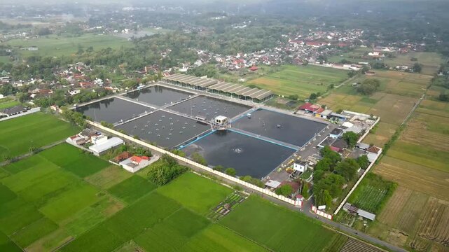Aerial footage of the Wastewater Treatment Plant in Bantul, Yogyakarta. Its purpose is to prevent water and soil pollution, protect human health, and preserve aquatic ecosystems, allowing for reproces