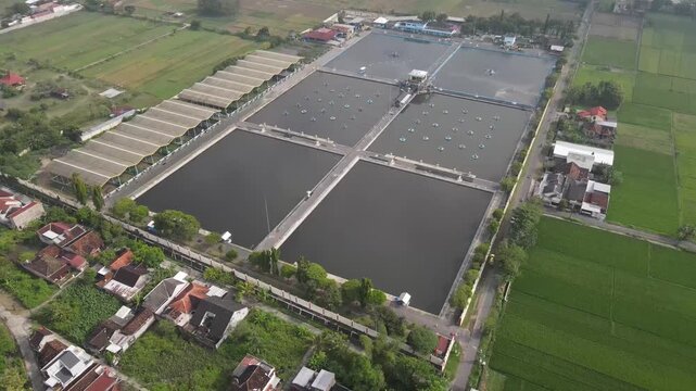 Aerial footage of the Wastewater Treatment Plant in Bantul, Yogyakarta. Its purpose is to prevent water and soil pollution, protect human health, and preserve aquatic ecosystems, allowing for reproces