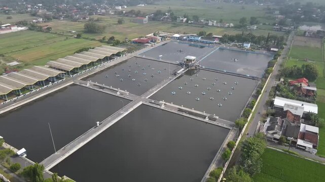 Aerial footage of the Wastewater Treatment Plant in Bantul, Yogyakarta. Its purpose is to prevent water and soil pollution, protect human health, and preserve aquatic ecosystems, allowing for reproces