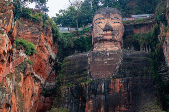 Leshan giant buddha carved into a red cliff in china