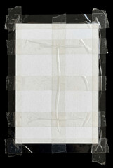 Naklejka premium A minimal studio photograph of a blank white paper sheet taped to a flat black background. The paper is centered vertically, slightly textured, with a soft off-white tone.