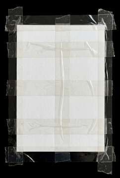 A minimal studio photograph of a blank white paper sheet taped to a flat black background. The paper is centered vertically, slightly textured, with a soft off-white tone.