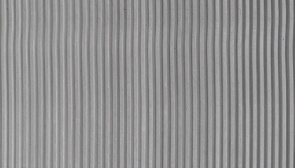 Obraz premium Wide View of Grey wavy Concrete Surface with Vertical Linear Pattern