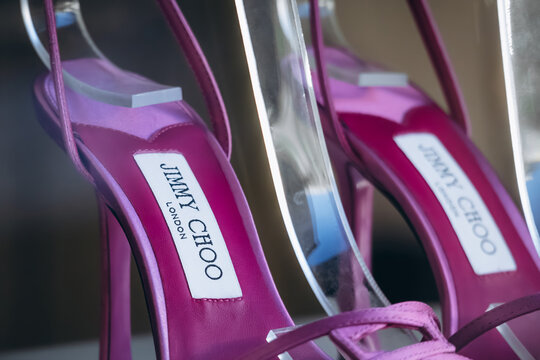 Saint-Tropez, France - December 8, 2025: Jimmy Choo high heel shoes displayed in a boutique window in Saint-Tropez