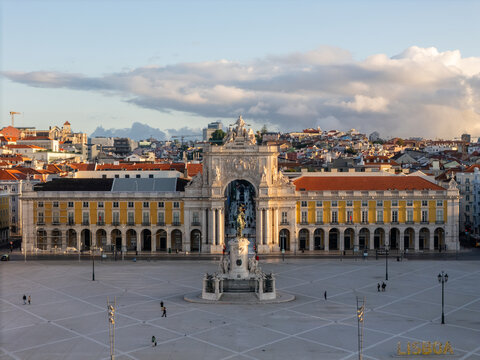 Aerial view of Praca do Comercio featuring the Rua Augusta Arch and the statue of King Jose I under a cloudy sky in Lisbon, Lisbon, Portugal.