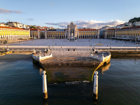 Aerial view of Praca do Comercio featuring the Rua Augusta Arch and Cais das Colunas by the Tagus river in Lisbon, Lisbon, Portugal.
