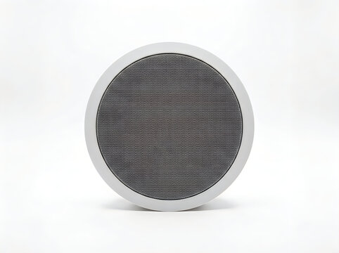 Modern circular speaker with metal mesh grille on white background, studio shot