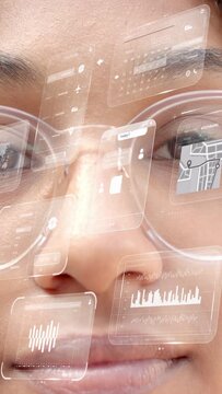 Vertical video: Teen girl opening eyes, AR panels floating over glasses, braces and updating orders