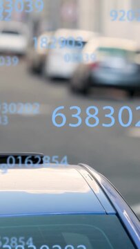Vertical video: Digits fading in, cam focusing on roof, people walking under overlay for city data