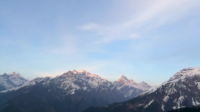 scenic himalayan mountains with snow capped peaks and soft evening light