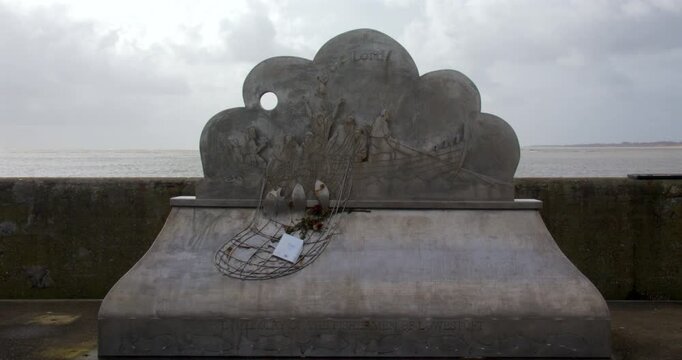 Wide shot of Lowestoft fisherman's memorial on South pier.