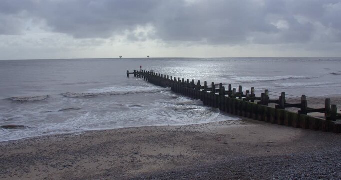 Extra Wide shot of groynes on south beach at Lowestoft